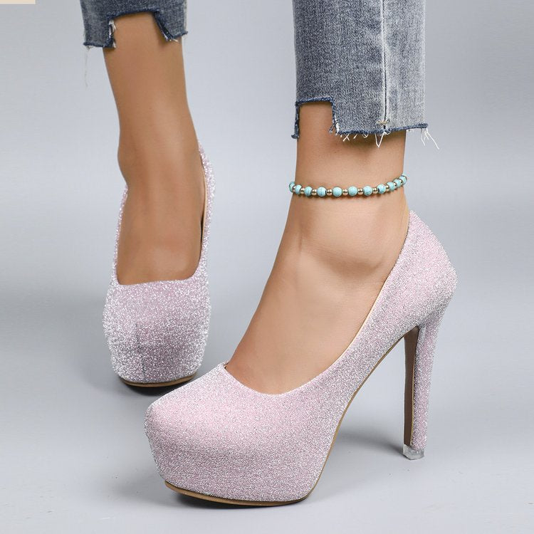 “Glam Game Strong” – Patent Stilettos for Everyday Icons