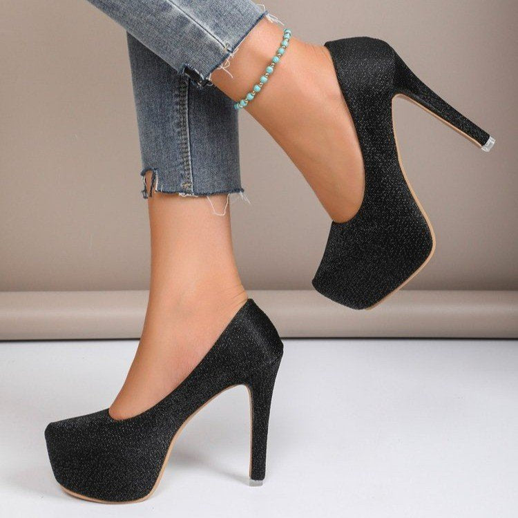 “Glam Game Strong” – Patent Stilettos for Everyday Icons