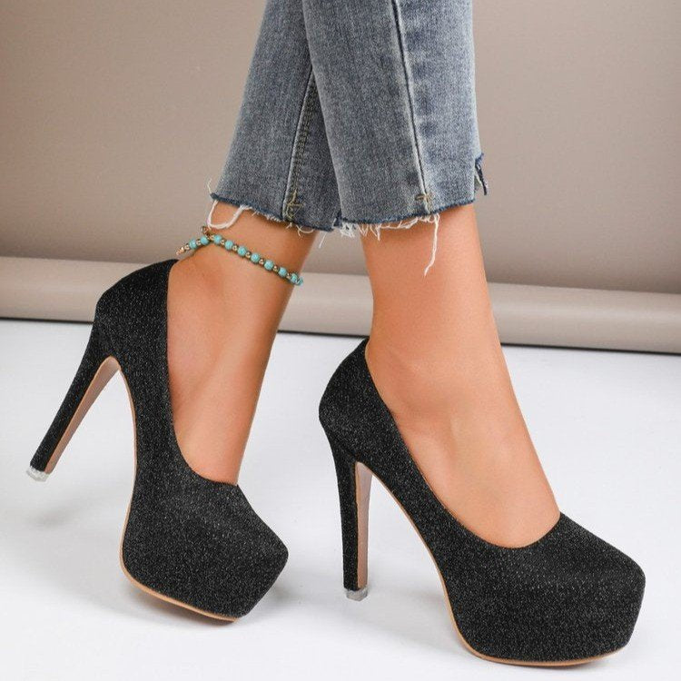 “Glam Game Strong” – Patent Stilettos for Everyday Icons