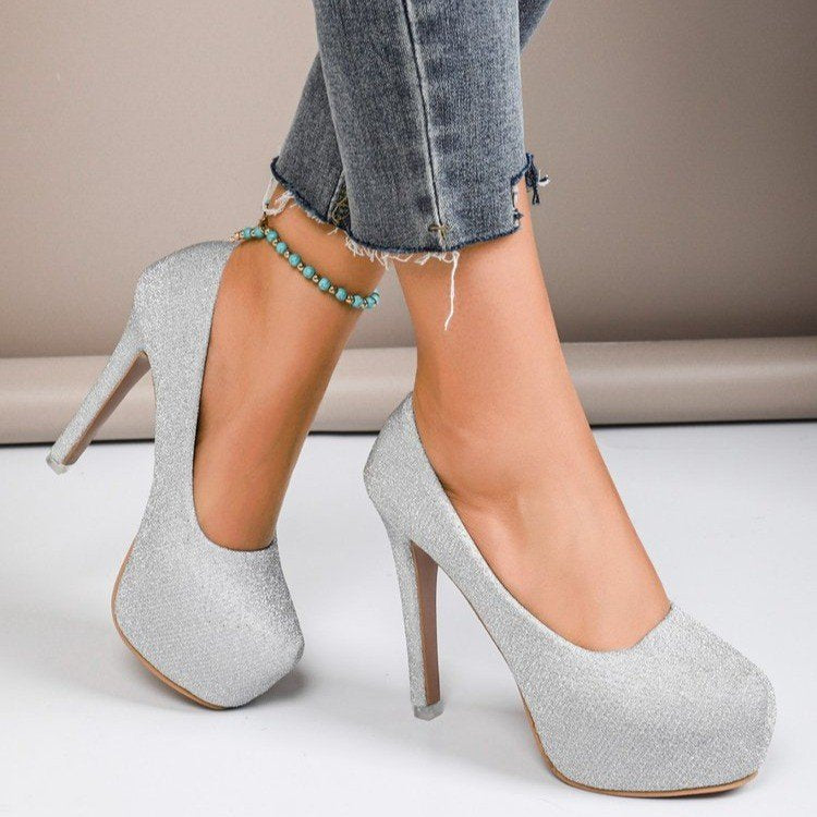“Glam Game Strong” – Patent Stilettos for Everyday Icons