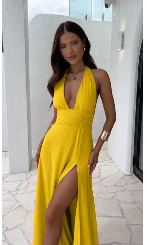 “Strap Drama” – The Backless Halterneck Dress That Owns the Night