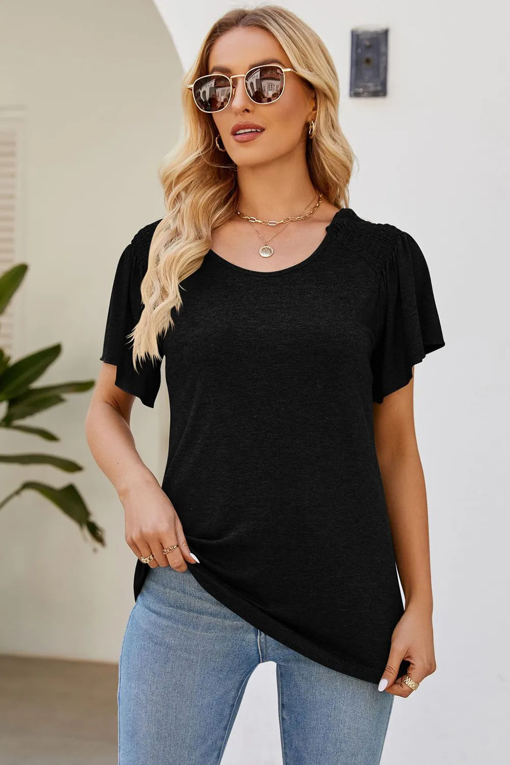 Solid color round neck pleated loose short sleeved T-shirt top for women