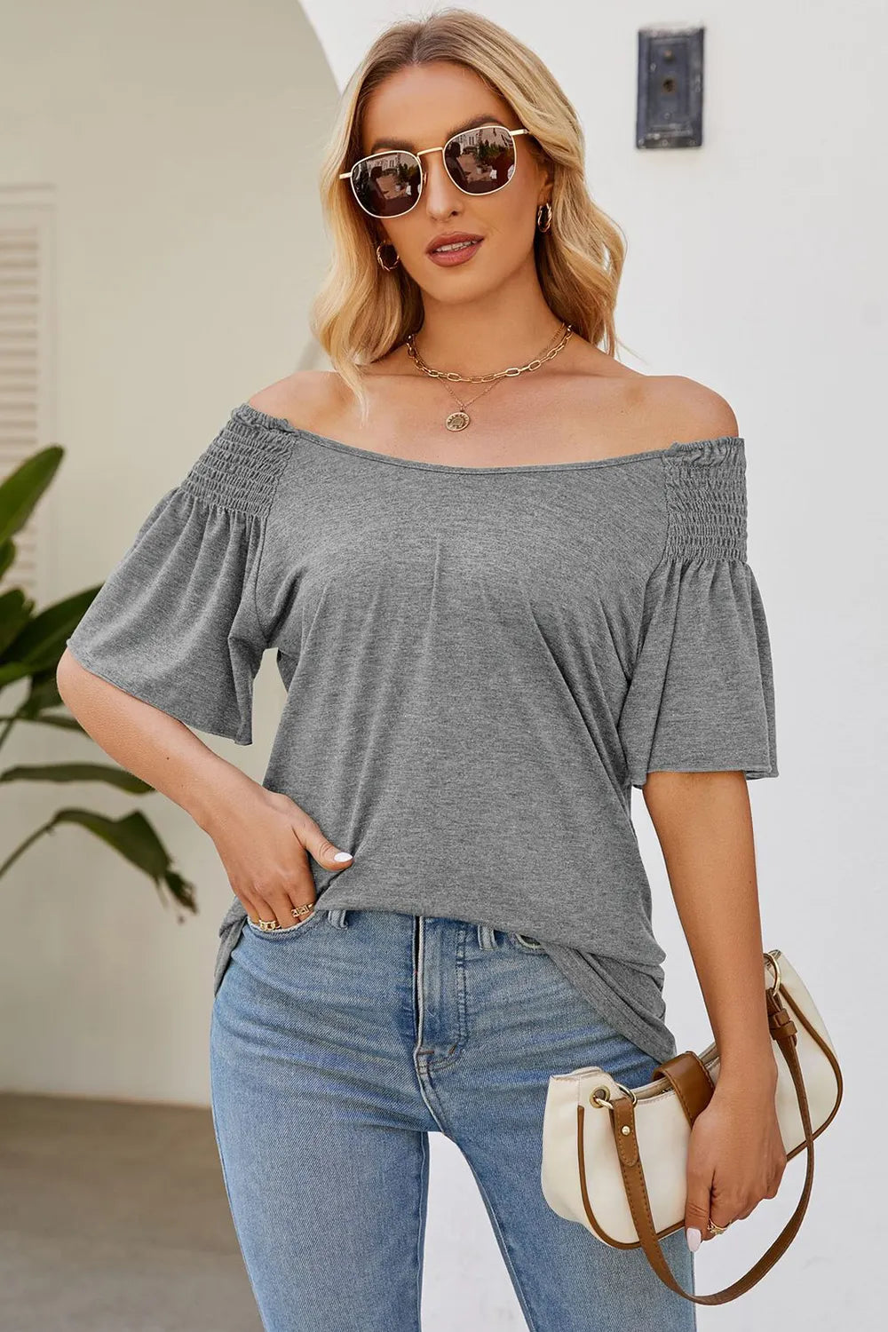 Solid color round neck pleated loose short sleeved T-shirt top for women